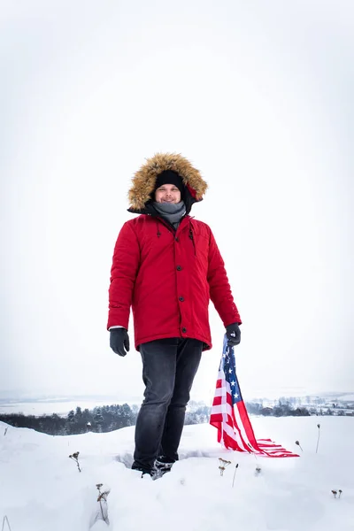 Man Red Winter Coat Holding Usa Flag Outdoors Snowy Weather — Stock Photo, Image