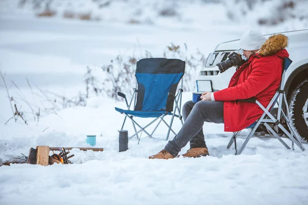 Young Adult Man Sitting Chair Winter Camp Fire Taking Picture — 스톡 사진