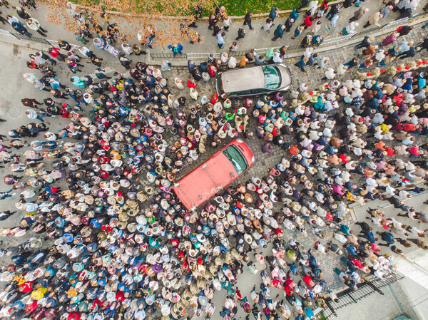LVIV, UKRAINE - October 7, 2018: aerial view religious procession at city streets