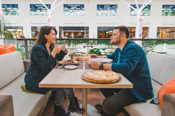 Couple having lunch in mall cafe together. date talking — Stock Photo, Image