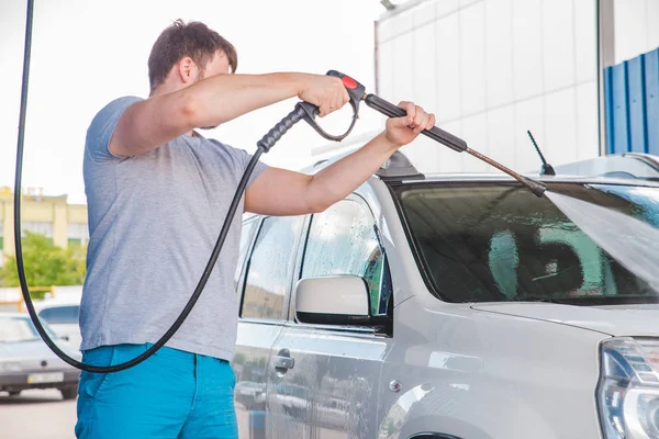 Car wash concept. vehicle in soap — Stock Photo, Image