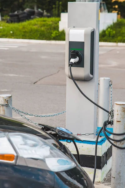 electric car charging at mall parking aria