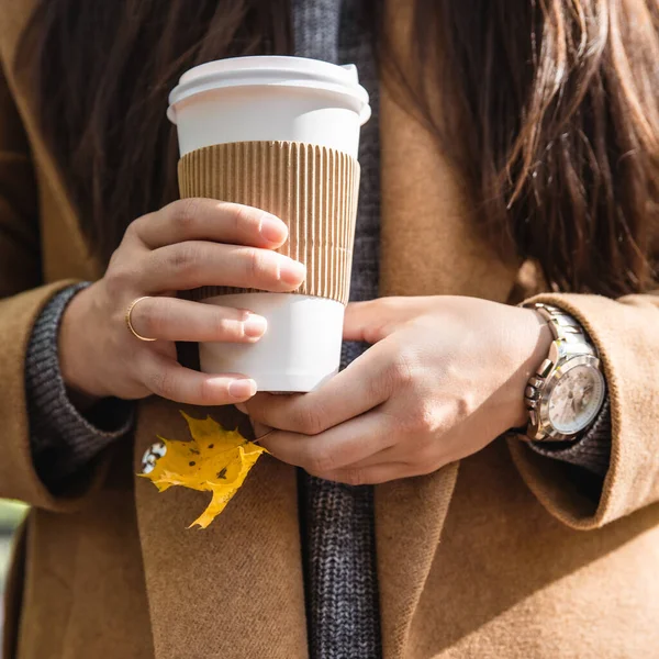 Woman holding coffee cup drink to go autumn fall season — Stock Photo, Image