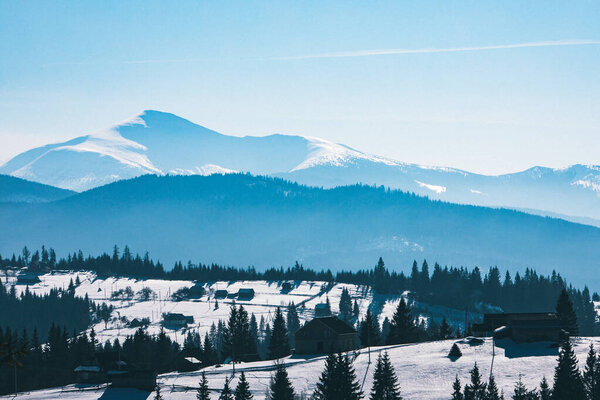 landscape view of snowed winter mountains