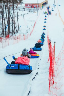 line for snow tubing. pull people up to hill.