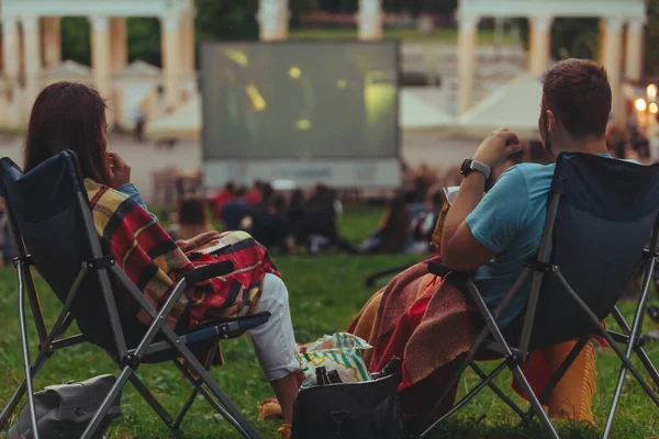 Couple Sitting Camp Chairs City Park Looking Movie Outdoors Open — Stock Photo, Image