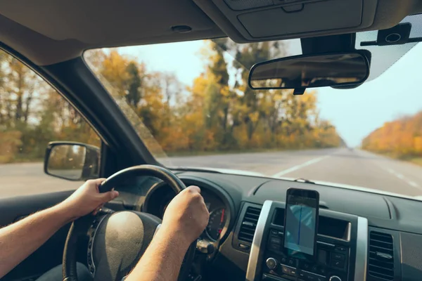 Road Trip Concept Man Hands Steering Wheel Navigation Phone Autumn — Stock Photo, Image