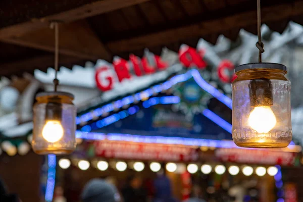 light bulb lamp in glass bottle outdoors cafe street food copy space