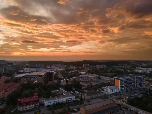 aerial view of sunrise over the city with stormy clouds. copy space