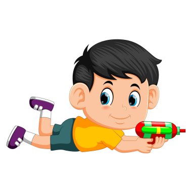 Çocuk su tabancasıyla oynuyor.