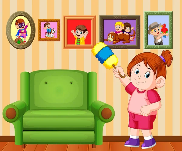 美丽的女孩在她的房子里用除尘器清洁框架照片 — 图库矢量图片