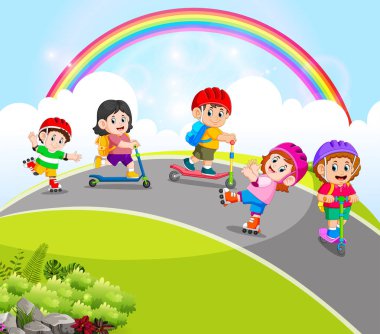  the children are playing with the scooter and roller skates in the road