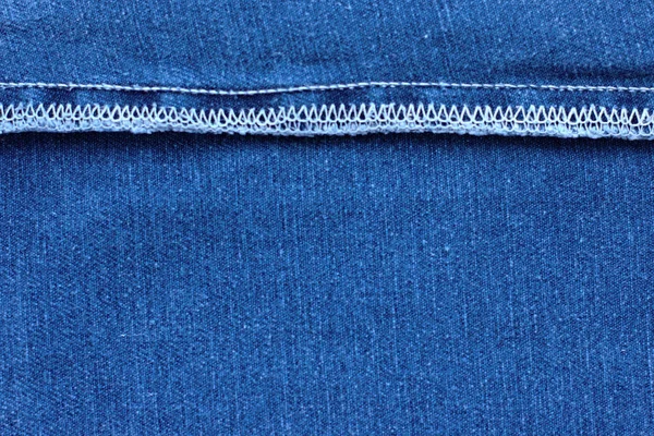 デニム ジーンズのデザインの背景繊維と布の構造 — ストック写真