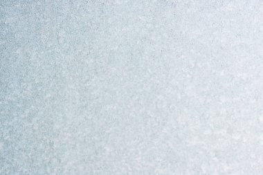 Ice background, frozen water with glass. Winter texture. Copy space