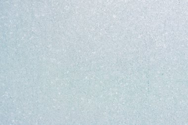 Ice background, frozen water with glass. Winter texture. Copy space