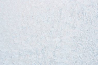 Ice background, frozen water with glass. Winter texture. Copy space