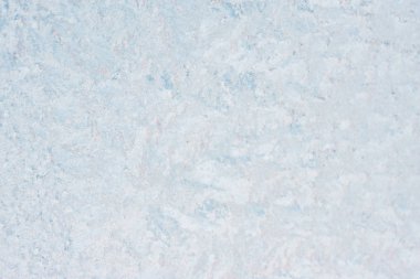 Ice background, frozen water with glass. Winter texture. Copy space