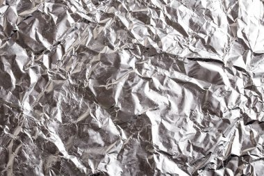 Buruşuk folyo parlak metal doku arka plan duvar kağıdı dekorasyon öğesi için kağıt ambalaj gümüş. Platin gri metalik