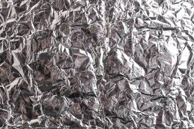 Buruşuk folyo parlak metal doku arka plan duvar kağıdı dekorasyon öğesi için kağıt ambalaj gümüş. Platin gri metalik