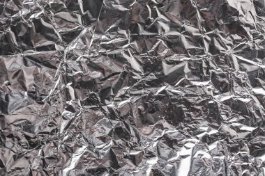 Buruşuk folyo parlak metal doku arka plan duvar kağıdı dekorasyon öğesi için kağıt ambalaj gümüş. Platin gri metalik