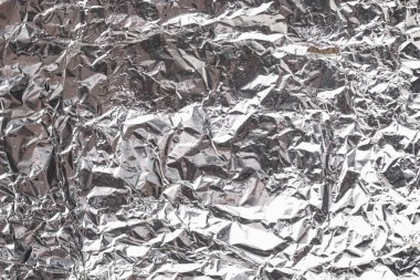 Buruşuk folyo parlak metal doku arka plan duvar kağıdı dekorasyon öğesi için kağıt ambalaj gümüş. Platin gri metalik