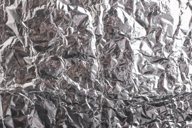 Buruşuk folyo parlak metal doku arka plan duvar kağıdı dekorasyon öğesi için kağıt ambalaj gümüş. Platin gri metalik