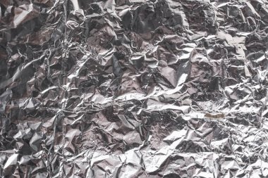 Buruşuk folyo parlak metal doku arka plan duvar kağıdı dekorasyon öğesi için kağıt ambalaj gümüş. Platin gri metalik