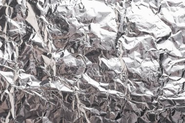 Buruşuk folyo parlak metal doku arka plan duvar kağıdı dekorasyon öğesi için kağıt ambalaj gümüş. Platin gri metalik
