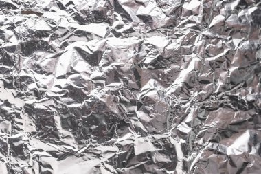 Buruşuk folyo parlak metal doku arka plan duvar kağıdı dekorasyon öğesi için kağıt ambalaj gümüş. Platin gri metalik