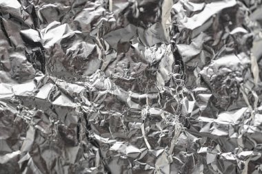 Buruşuk folyo parlak metal doku arka plan duvar kağıdı dekorasyon öğesi için kağıt ambalaj gümüş. Platin gri metalik