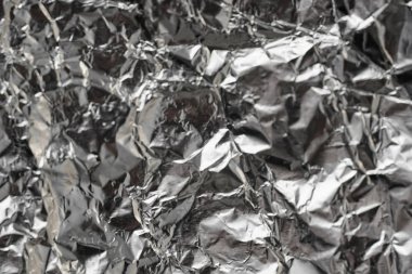 Buruşuk folyo parlak metal doku arka plan duvar kağıdı dekorasyon öğesi için kağıt ambalaj gümüş. Platin gri metalik