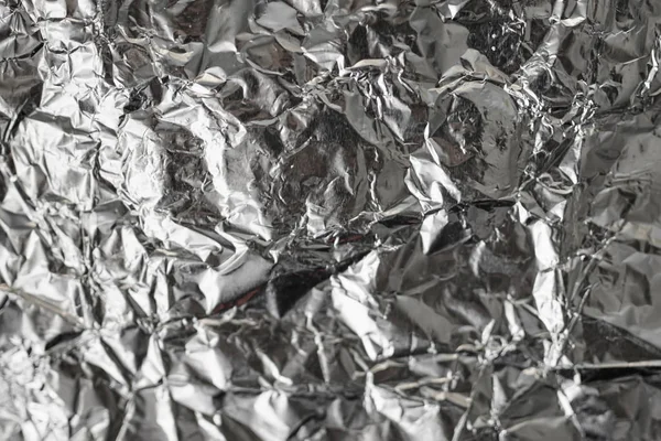 银皱巴巴的箔闪亮的金属纹理背景包装纸壁纸装饰元素 灰色铂金金属 — 图库照片