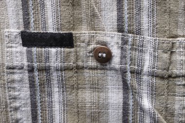 Kenevir kumaşı bir gömlek parçası kapatın. Sıradan adamın gömleği desenli. Pamuk ve kenevir arka plan buruşuk doku