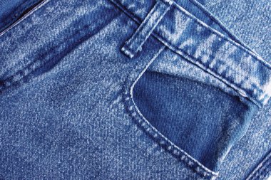 Klasik kot arka plan. Denim doku kumaş dikiş şık tasarımı ile. Boş desen kopya alanı. Seçici odak