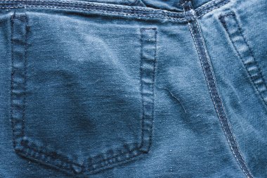 Klasik kot arka plan. Denim doku kumaş dikiş şık tasarımı ile. Boş desen kopya alanı. Seçici odak