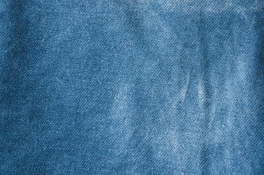 Klasik kot arka plan. Denim doku kumaş dikiş şık tasarımı ile. Boş desen kopya alanı. Seçici odak