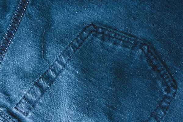 Pantalones Vaqueros Fondo Tejido Textura Mezclilla Azul Con Una Costura —  Fotos de Stock