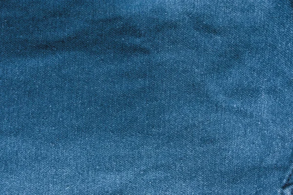 Pantalones Vaqueros Fondo Tejido Textura Mezclilla Azul Con Una Costura — Foto de Stock