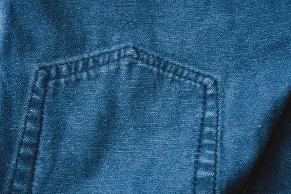 经典蓝色牛仔裤背景 牛仔纹理面料与时尚的设计接缝 空模式复制空间 选择性对焦 — 图库照片