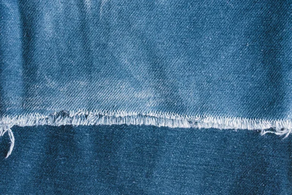 背景青のジーンズ デニム テクスチャ生地おしゃれなデザインの継ぎ目 空パターン コピー スペース — ストック写真