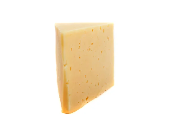 Stück Käse isoliert auf weißem Hintergrund Ausschnitt — Stockfoto