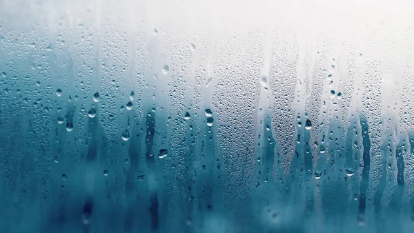 Dripping Condensation on the clear glass window. Water drops. Ab — Stock Photo, Image