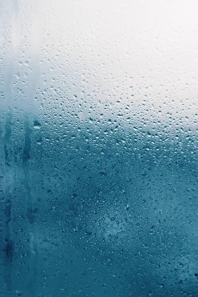 Dripping Condensation on the clear glass window. Water drops. Ab — Stock Photo, Image