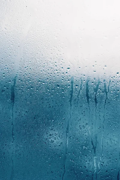 Dripping Condensation on the clear glass window. Water drops. Ab — Stock Photo, Image