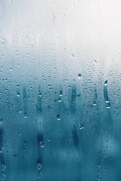 Dripping Condensation on the clear glass window. Water drops. Ab — Stock Photo, Image