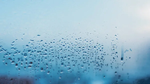 Image with condensation formed by water droplets on glass due to — Stock Photo, Image