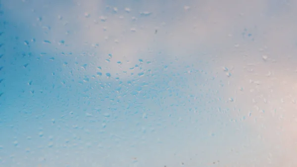 Image with condensation formed by water droplets on glass due to — Stock Photo, Image