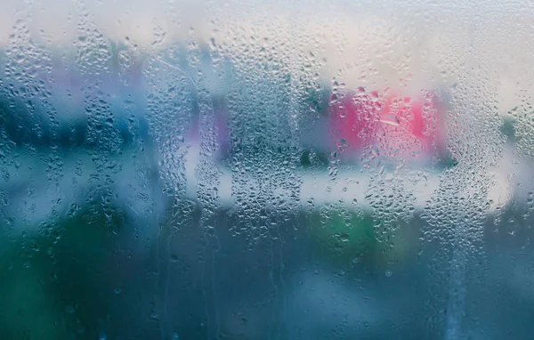 Moist word written on wet window. High level of dampness in apar — Stock Photo, Image