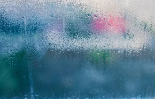 Moist word written on wet window. High level of dampness in apar — Stock Photo, Image