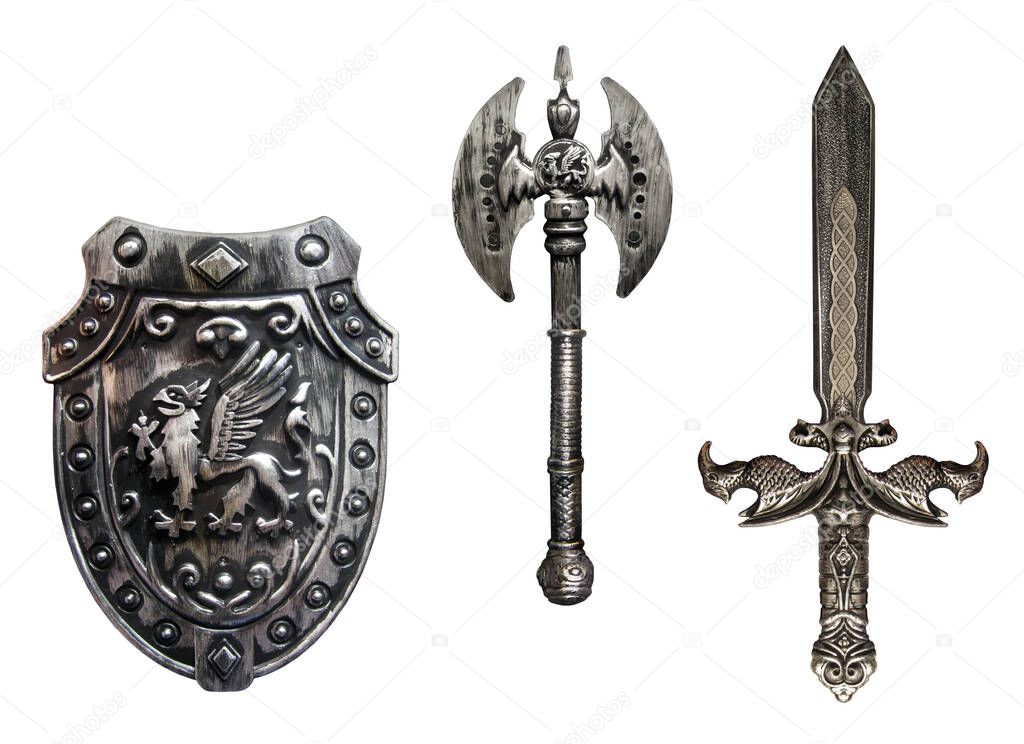 There are a shield, a sword and a battle ax. White background. Isolated.